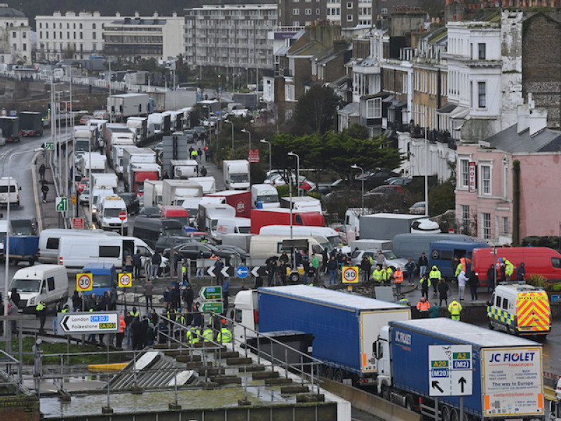 Clogged UK port reopens in chaos as truckers await Covid tests