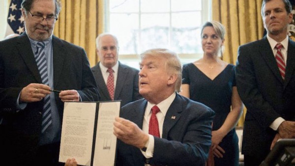 https://www.ajot.com/images/uploads/article/653-trump-signed-order.jpg