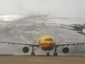 https://www.ajot.com/images/uploads/article/660-dhl-plane-landing.jpg