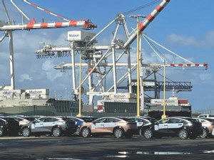 https://www.ajot.com/images/uploads/article/751-Port_of_Honolulu_Matson_unloading.jpg