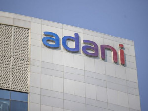 https://www.ajot.com/images/uploads/article/Adani_building.jpg