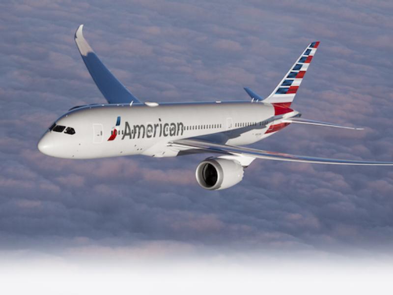 American Air to cut overseas flights 25% in slow recovery