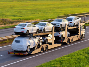 https://www.ajot.com/images/uploads/article/AutoTransportCarHauling.jpg