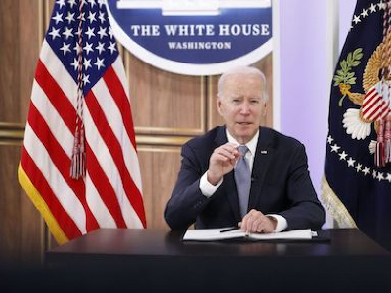 Biden urges global carbon cut, pledges $1 billion to UN fund