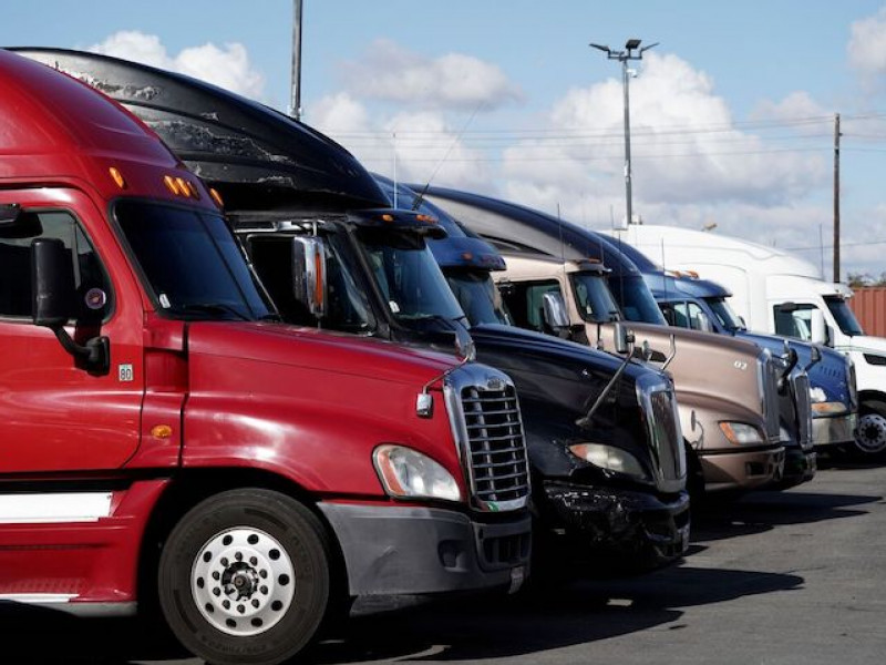 Senate votes to overturn Biden’s anti-smog rules for big rigs