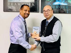 https://www.ajot.com/images/uploads/article/Celebrating-WFS%E2%80%99-achievement-are-Romnel-Jean-Jacques-%28WFS%29-and-William-Lee-of-SF-Airlines-.png