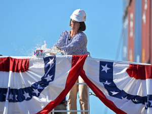 https://www.ajot.com/images/uploads/article/Christine-Crowley-christening-the-ship.jpg