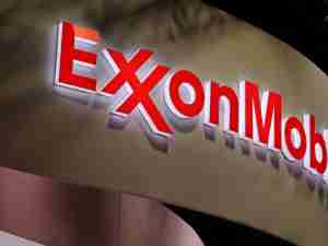 Exxon slips after flagging weak fourth-quarter earnings on refining squeeze