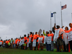 Biden says sees progress in US port labor dispute as strike enters third day