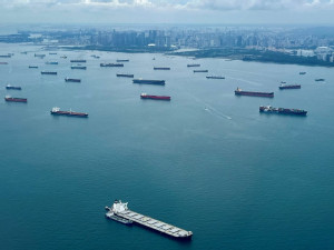 https://www.ajot.com/images/uploads/article/Singapore_Ships-in-the-water.jpg