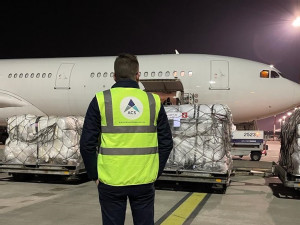 https://www.ajot.com/images/uploads/article/Ukraine_aid_flight_March_2022.jpg