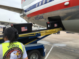 https://www.ajot.com/images/uploads/article/american-airlines-cargo-us-flags-unloading.jpg