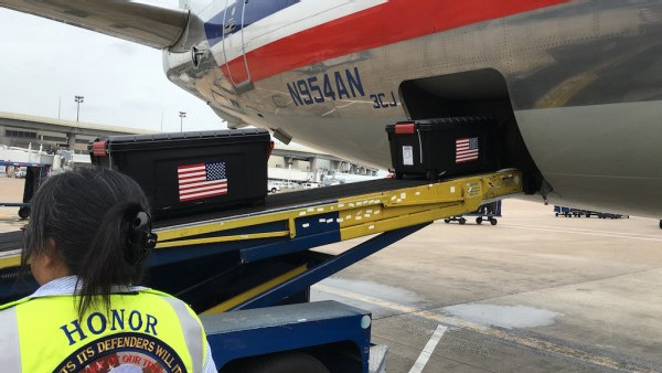 https://www.ajot.com/images/uploads/article/american-airlines-cargo-us-flags-unloading.jpg