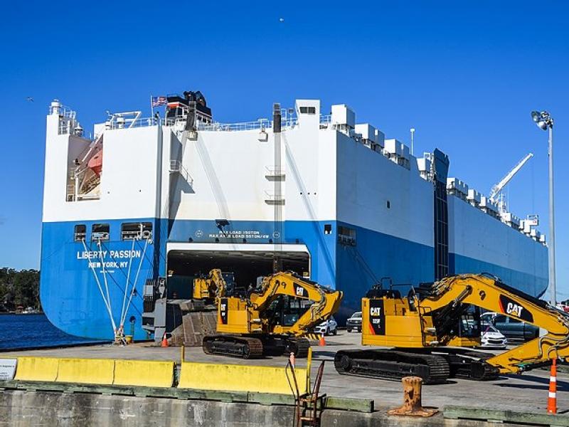 Dozens of massive Caterpillar excavators move through JAXPORT