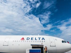 https://www.ajot.com/images/uploads/article/delta_cargo-plane-loading.jpeg