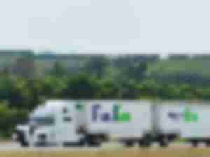 https://www.ajot.com/images/uploads/article/fedex-double--33-tandem-trailer.jpg