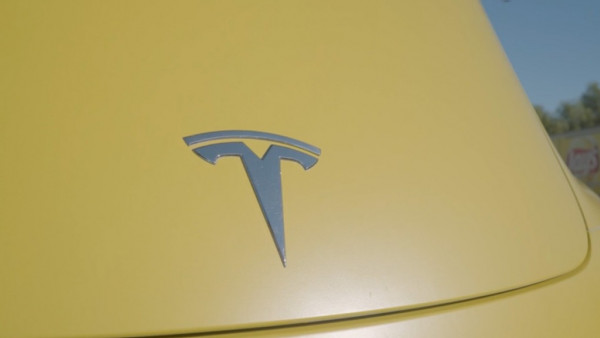 https://www.ajot.com/images/uploads/article/frito-lay-tesla-emblem.jpg