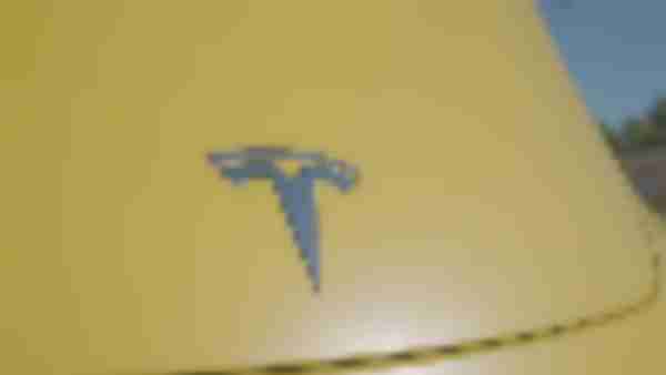 https://www.ajot.com/images/uploads/article/frito-lay-tesla-emblem.jpg