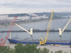 https://www.ajot.com/images/uploads/article/indiana-gantry-crane-loading-ship.06272019.jpg