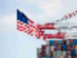 https://www.ajot.com/images/uploads/article/long-beach-container-cranes-us-flag.jpg