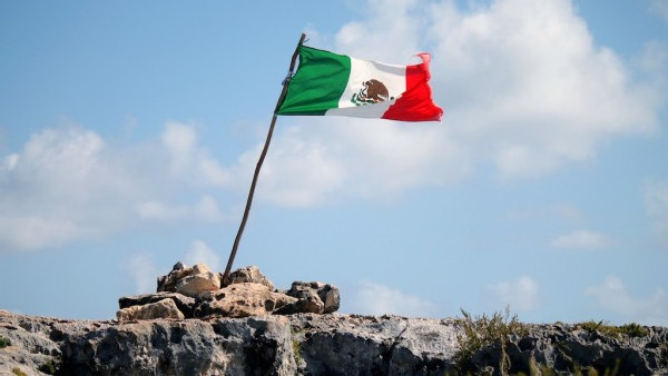 https://www.ajot.com/images/uploads/article/mexico-flag-on-hilltop.jpg