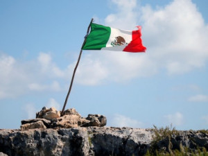 https://www.ajot.com/images/uploads/article/mexico-flag-on-hilltop.jpg