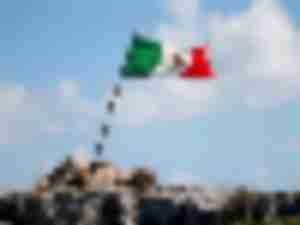 https://www.ajot.com/images/uploads/article/mexico-flag-on-hilltop.jpg