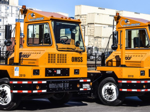 https://www.ajot.com/images/uploads/article/orannge-pure-electric-port-trucks-oakland.jpg