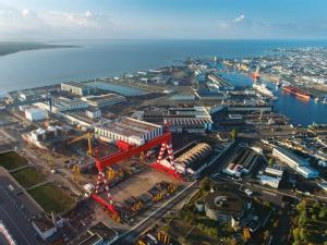 https://www.ajot.com/images/uploads/article/stx-france-shipyard-aerial.png