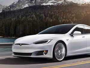 https://www.ajot.com/images/uploads/article/tesla-sedan.jpg