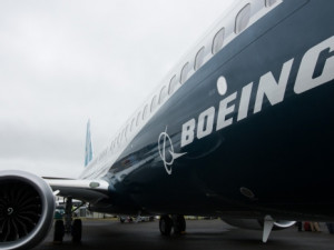 https://www.ajot.com/images/uploads/article/the-boeing-co-logo-sits-on-the-side-of-a-737-max-aircraft-during-preparations-ahead-of-the-farnborough-international-airshow-2016-in-farnborough-u-k.jpg