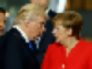 https://www.ajot.com/images/uploads/article/white-house-officials-reportedly-said-that-time-angela-merkel-had-to-explain-the-fundamentals-of-eu-trade-to-trump-11-times-was-humiliating.png