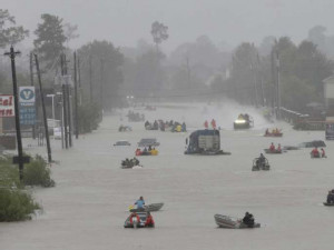 https://www.ajot.com/images/uploads/article/houston-levies-broken-flood-harvey.jpg