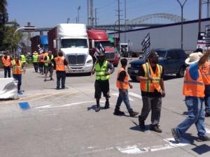 https://www.ajot.com/images/uploads/article/west-coast-teamster-strike-polb-la_cropped.jpeg