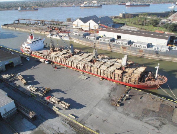 A log ship is loaded at a new facility of the St. Bernard Port, Harbor and Terminal District. 