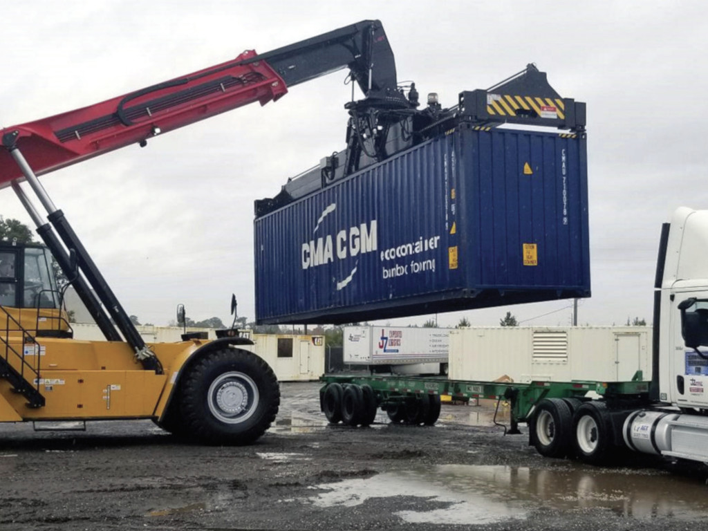 A newly acquired 99,000-pound-capacity SANY reachstacker is a key feature of North Florida Warehouse FTZ’s expanded facilities serving Jacksonville cargo interests, including heavylift and breakbulk markets.