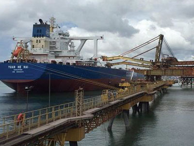 Vale vessel loading up with iron ore at the Port of Turbarao, Brazil