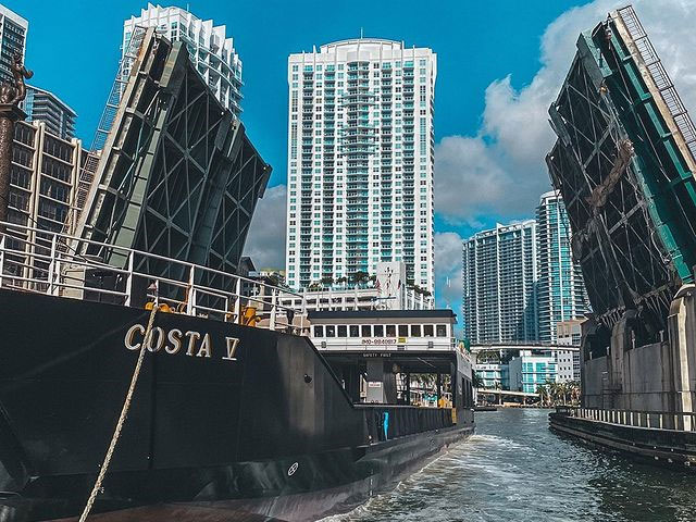 Centauri Transport’s Costa V passes under a raised bascule bridge in serving shallow-draft Bahamian ports from a Miami River terminal.