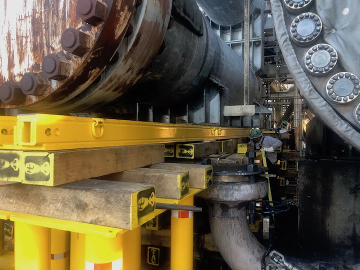 Both heat exchangers weighed in excess of 250,000 lbs. Shown here loaded on the HT500 system and engineered 100-ton modular support stands.