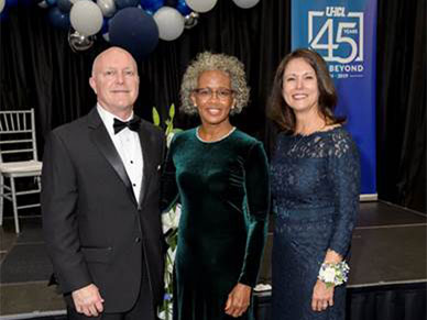 Port Freeport Executive Director/CEO Phyllis Saathoff receives the 2019 Distinguished Alumni Award from UHCL President Ira K. Blake.