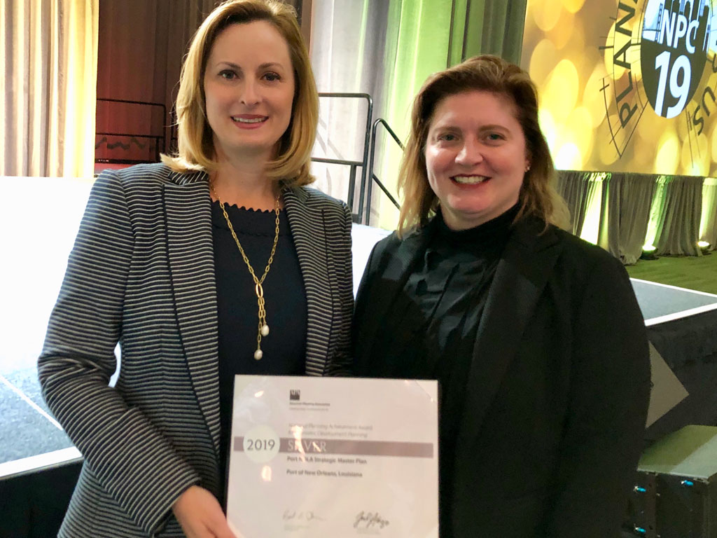 Port NOLA President & CEO Brandy D. Christian and Port NOLA Director of Sustainable Development Amelia Pellegrin accepting the award at the APA’s luncheon on behalf of Port NOLA. 