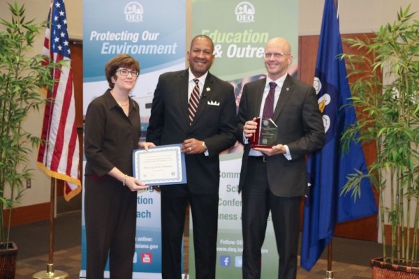 Andree Fant (left), Port NOLA Vice President of Planning & Facilities, and Robert Lloyd (right), Port NOLA Environmental Scientist, accepts an Environmental Leadership Award from Dr. Chuck Carr Brown (center), LDEQ Secretary.