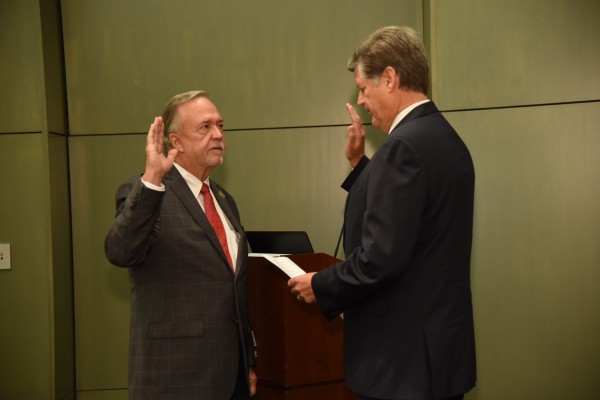 Charles H. Ponstein is sworn in by attorney Wayne J. McDougall to serve a five-year term on the Board of Commissioners of the Port of New Orleans. He succeeds William T. Bergeron in representing St. Bernard Parish on the seven-member board.