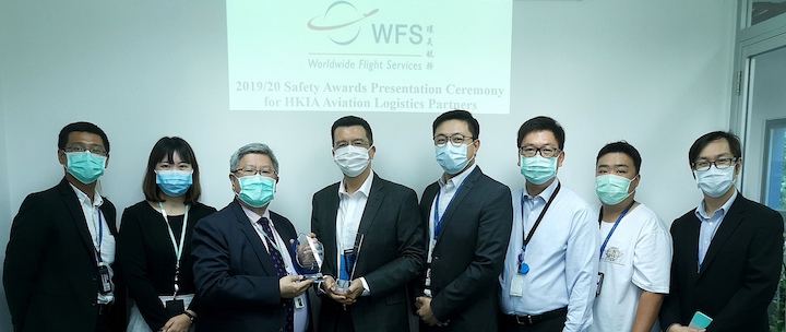 (from the left) Alex Kwok (WFS), Cari Lai (AAHK), Eddie Chui (AAHK), James Carey (WFS), Jeff Tsui (WFS), Henry Lam (WFS), Camus Wan (WFS), and Matthew Wu (AAHK)