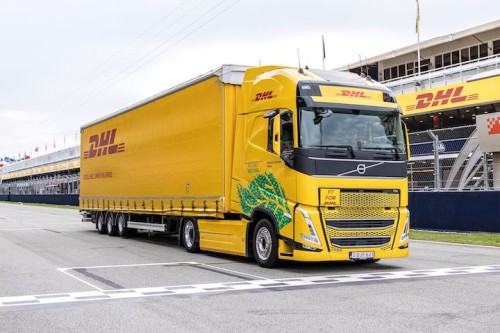 https://www.ajot.com/images/uploads/article/DHL_truck.jpeg