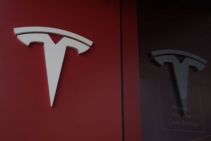 https://www.ajot.com/images/uploads/article/Tesla_logo.jpg