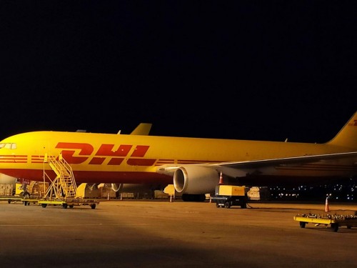 https://www.ajot.com/images/uploads/article/dhl-freighter-on-tarmac.jpg