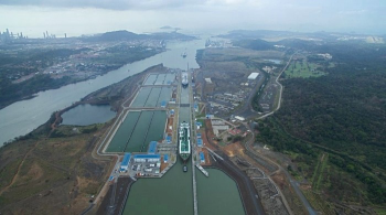 https://www.ajot.com/images/uploads/article/panama-canal-lng-tanker-aerial.png