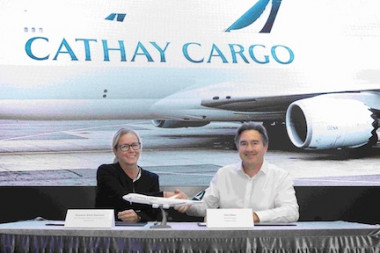 https://www.ajot.com/images/uploads/article/Cathay_Cargo_Commemorates_DB_Schenker.jpg_copy_.jpg