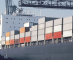 https://www.ajot.com/images/uploads/article/generic-containership-in-port.png